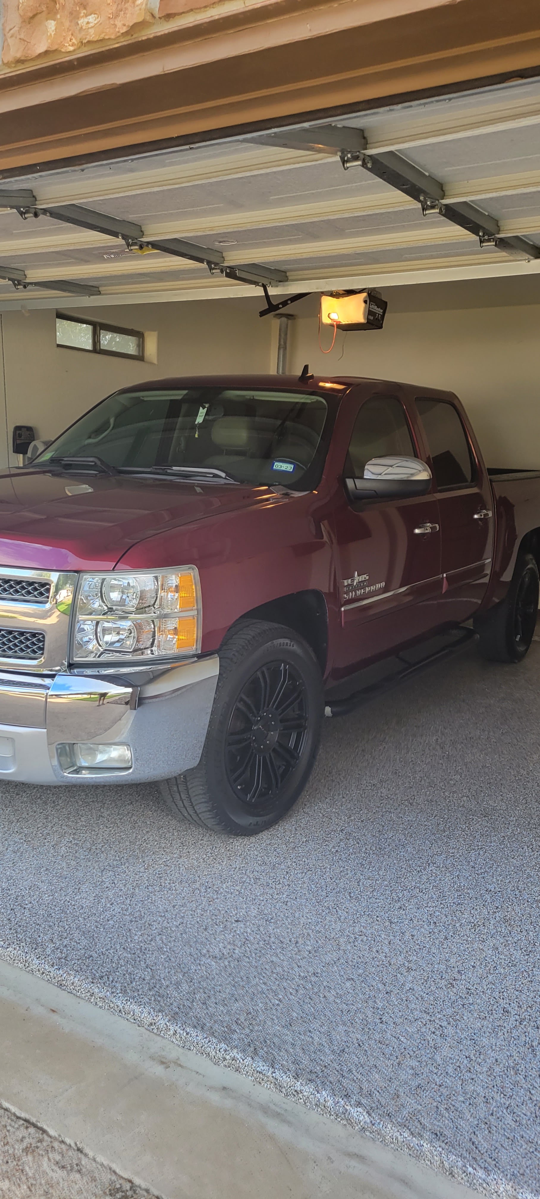 Repainted black truck with Texas Sierra decal at Lapp's Paint & Body